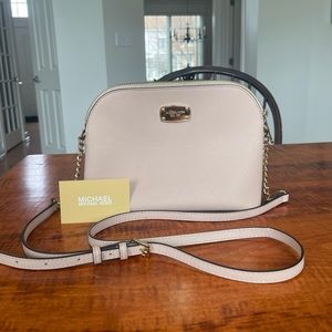 Michale Kors cross body light pink purse